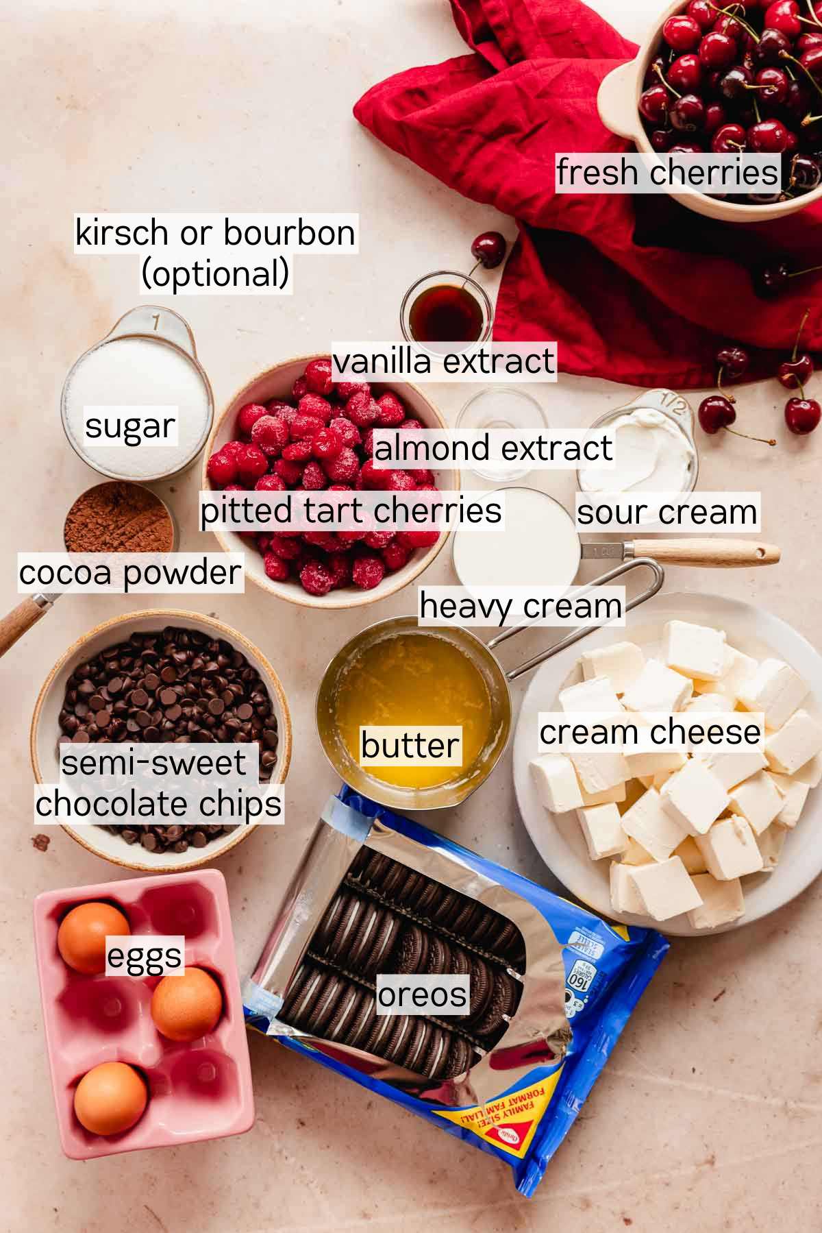 ingredients for black forest cheesecake in bowls