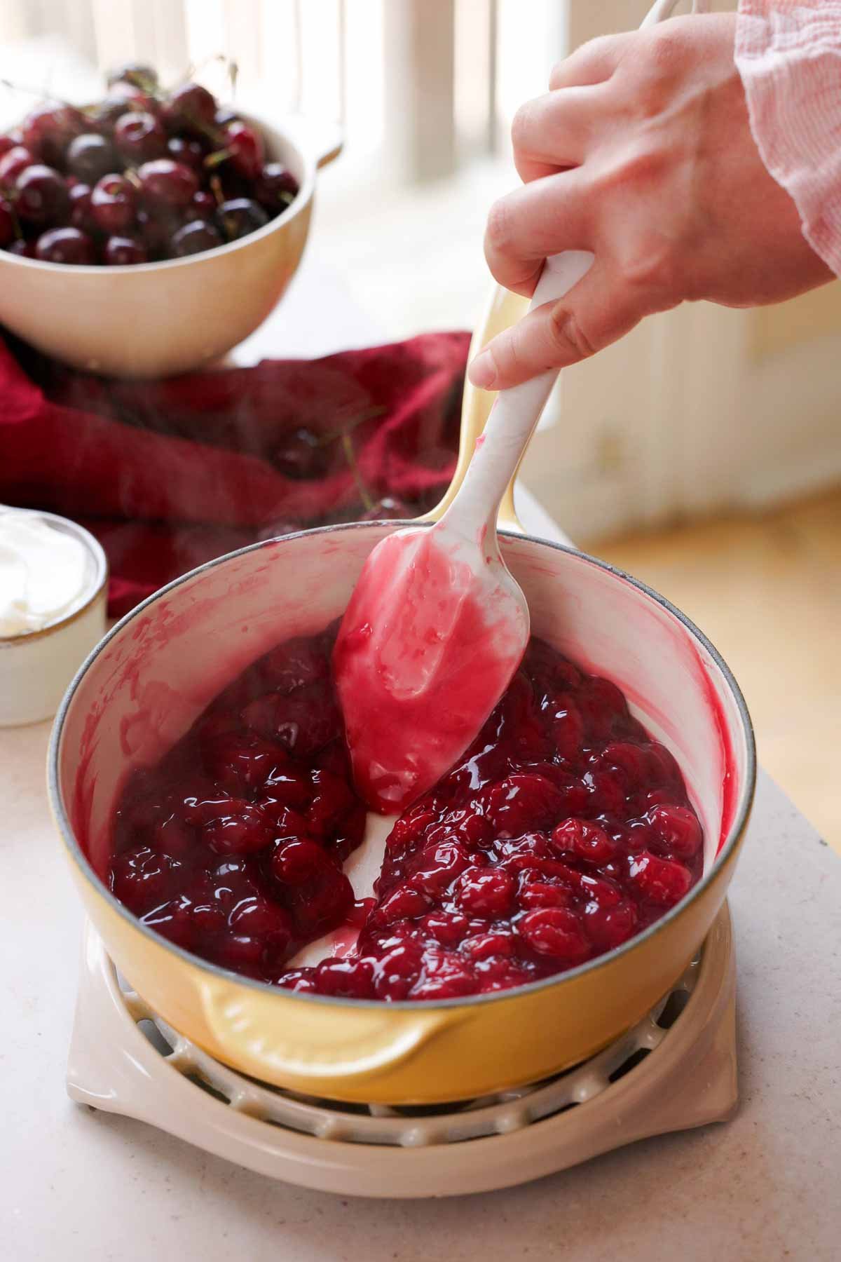 thickened tart cherry sauce in saucepan