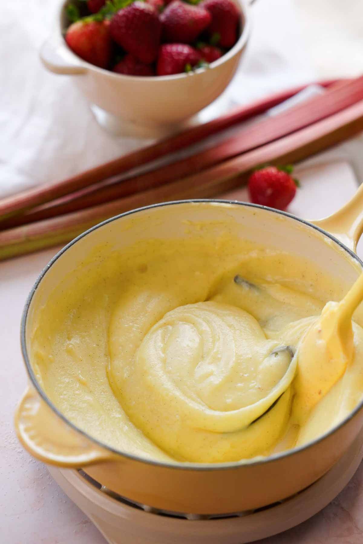 thick, cooked custard in saucepan