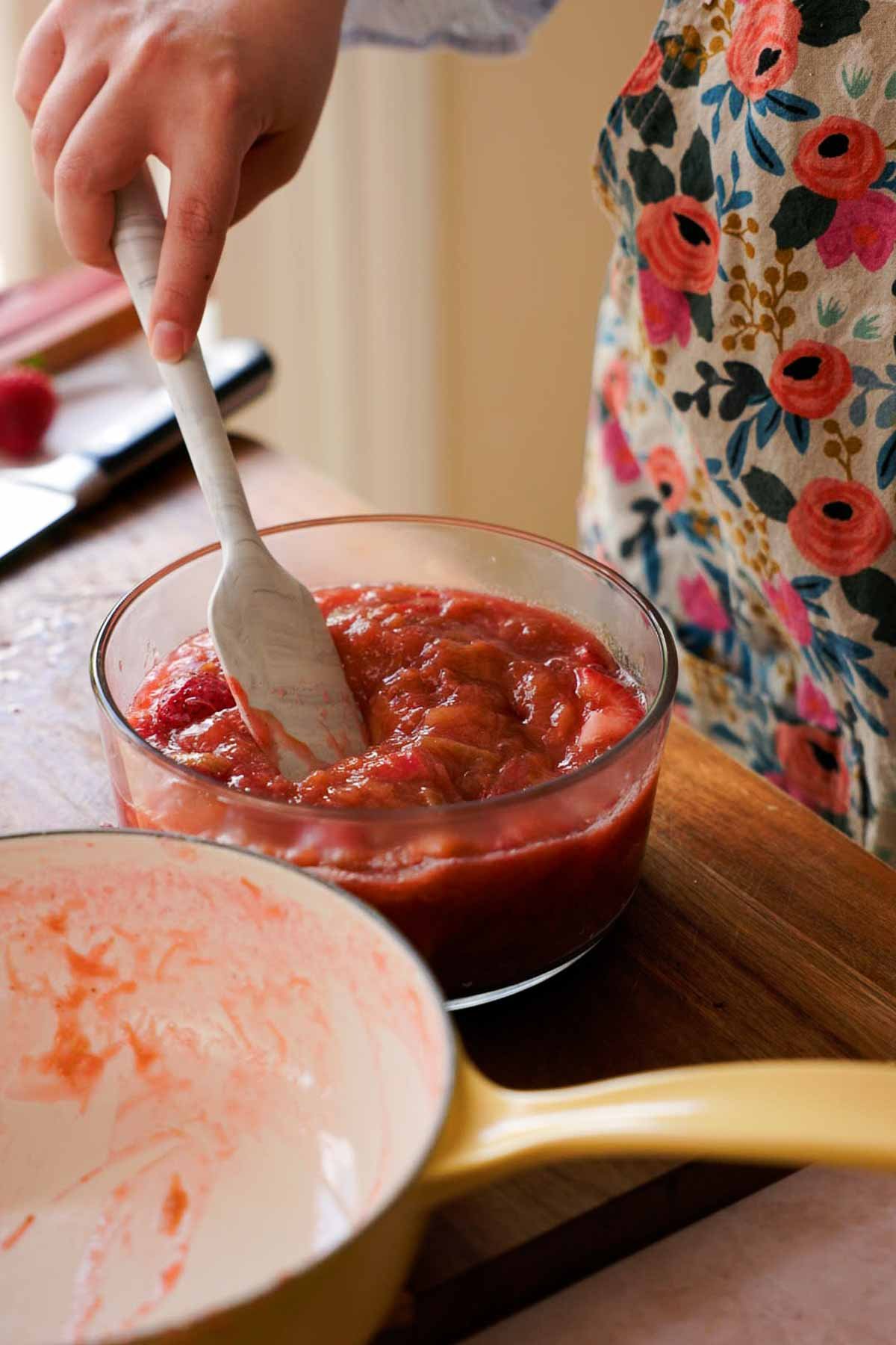 cooked rhubarb and fresh strawberry compote in glass container