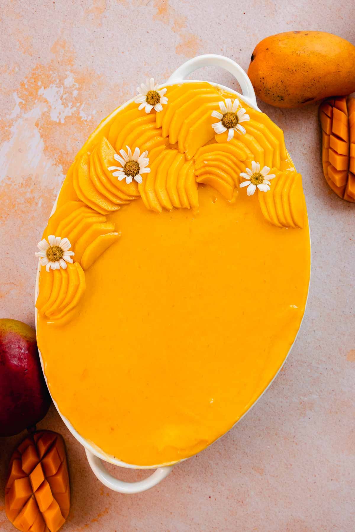 mango tiramisu with daisies on top