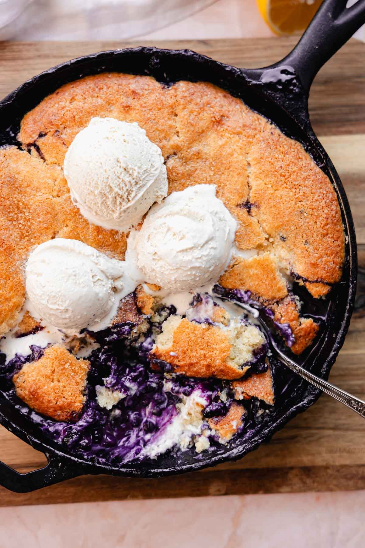 blueberry lemon cobbler with cream cheese and ice cream