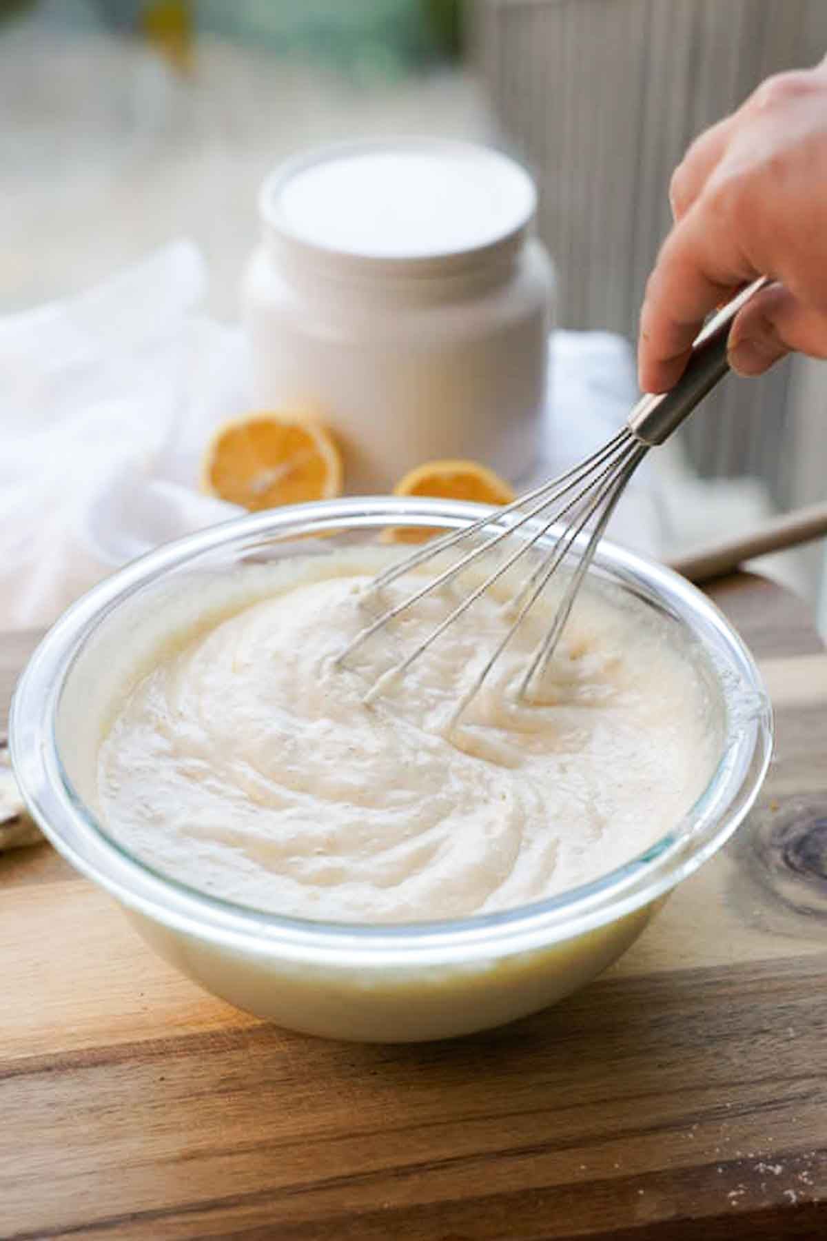 whisking lemon cobbler batter topping