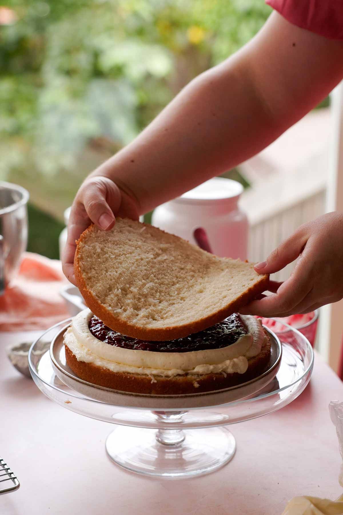 layering coconut cake layers