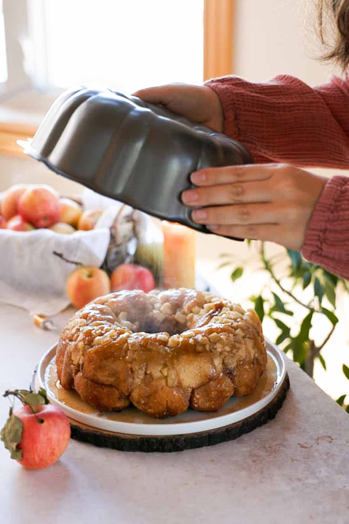 releasing apple monkey bread from bundt pan
