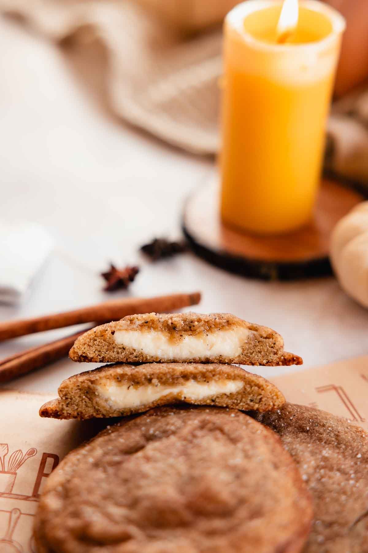 chai cookie cut in half with lit candle