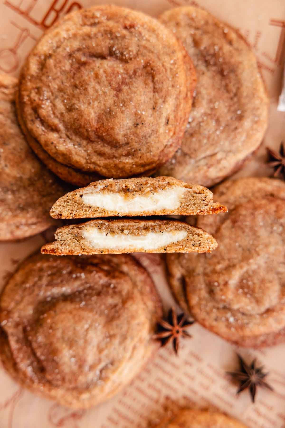 chai cookie cut in half to show cheesecake center