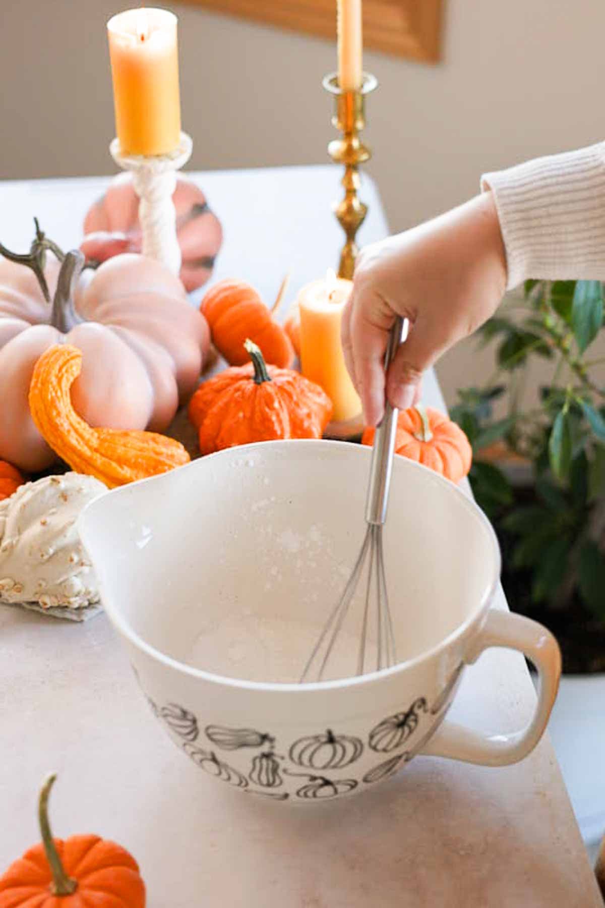 whisking sugar and cornstarch in a large bowl