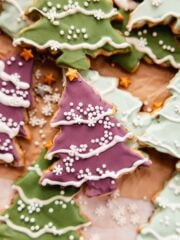 purple and green decorated christmas tree sugar cookies