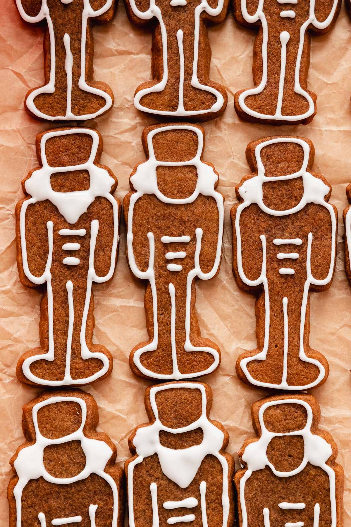 gingerbread nutcracker cookies lined up in rows