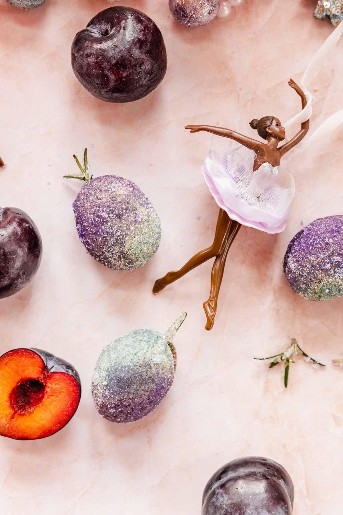 sugar plum cookies on pink marble with ballerina toy