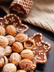 walnut shaped oreshki cookies on a plate