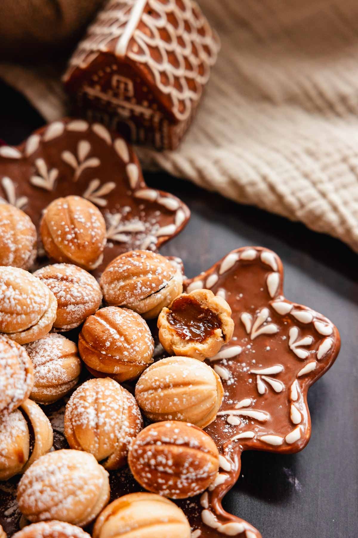 walnut shaped oreshki cookies on a plate