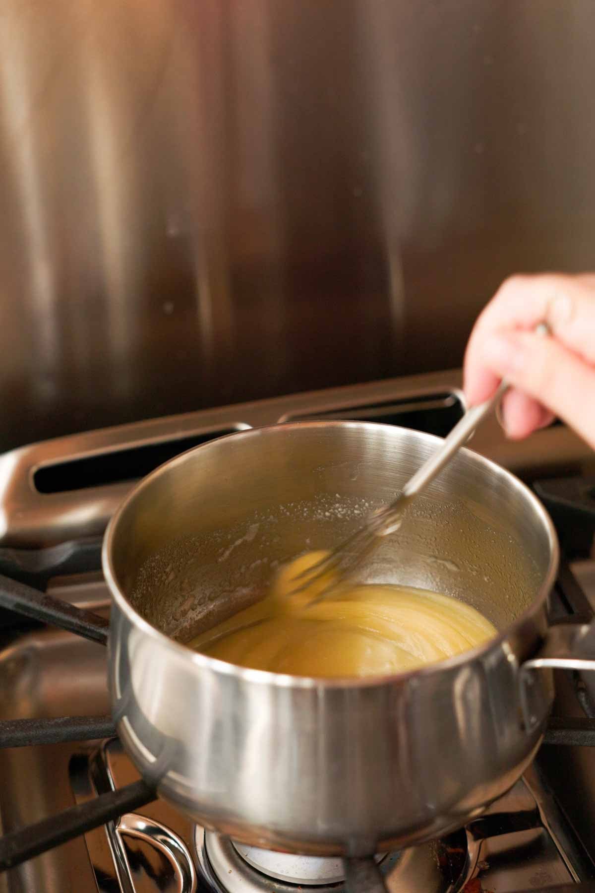 whisking butter and sugar together for toffee