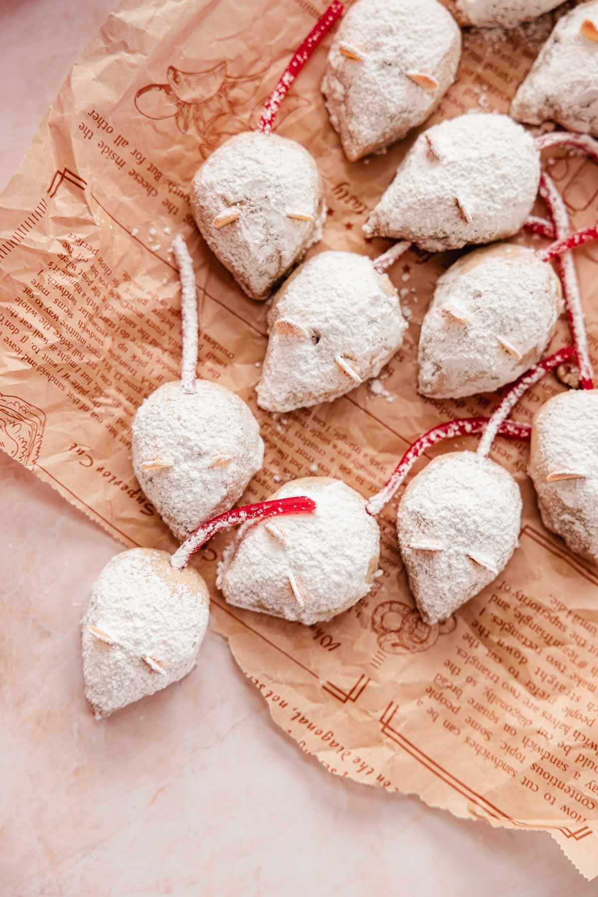snowball cookies shaped into christmas mice