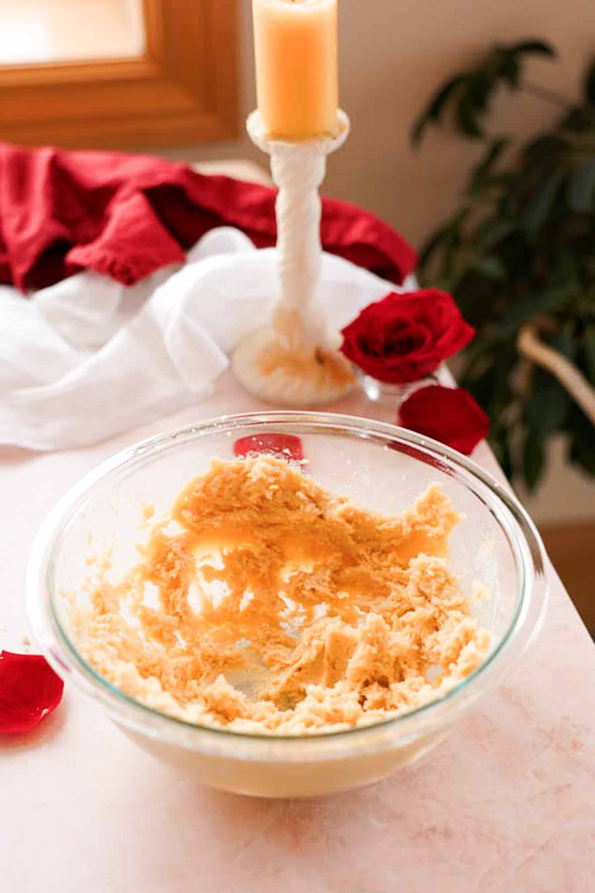 mixed butter and sugar in a glass bowl