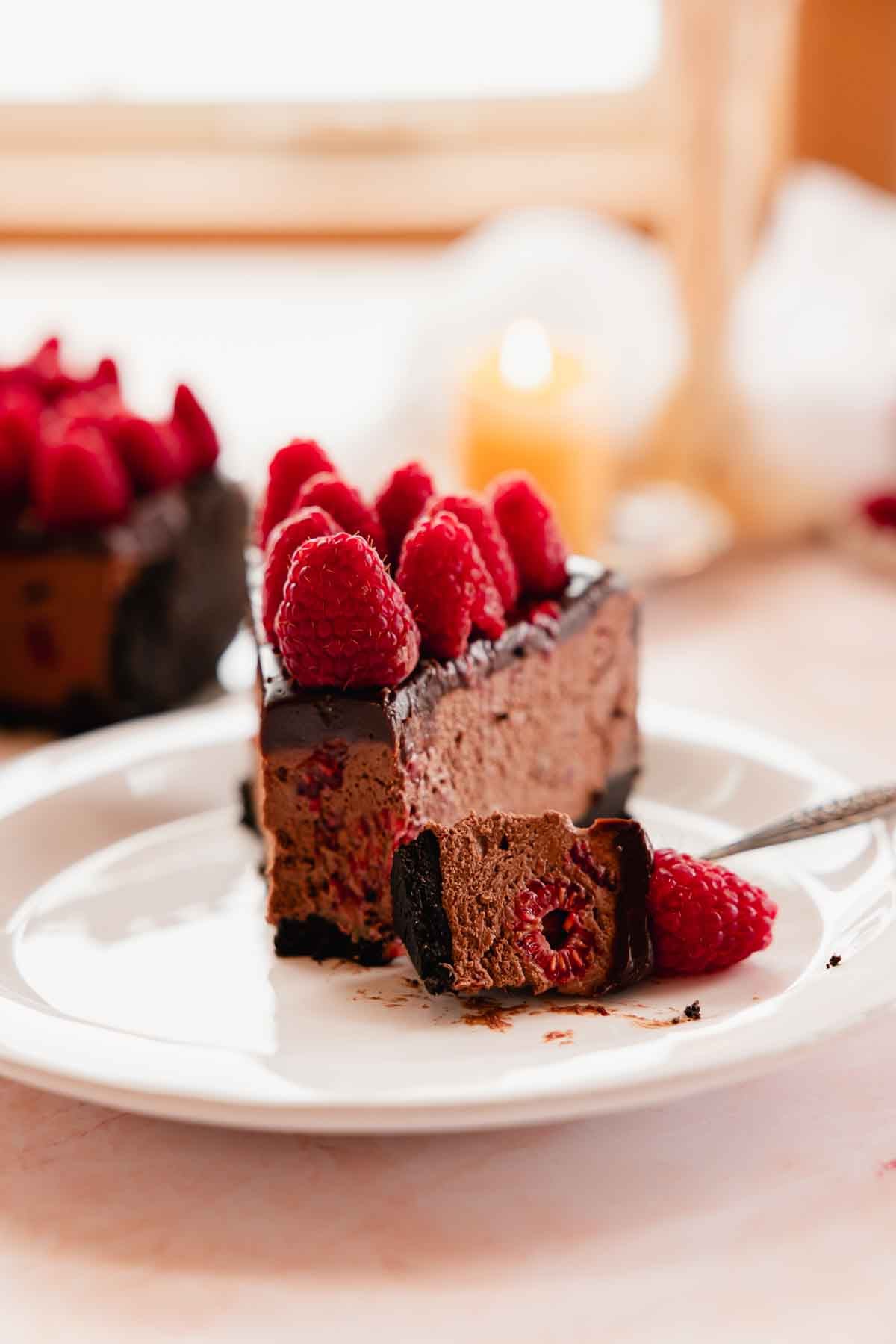 closeup of creamy texture of chocolate raspberry cheesecake