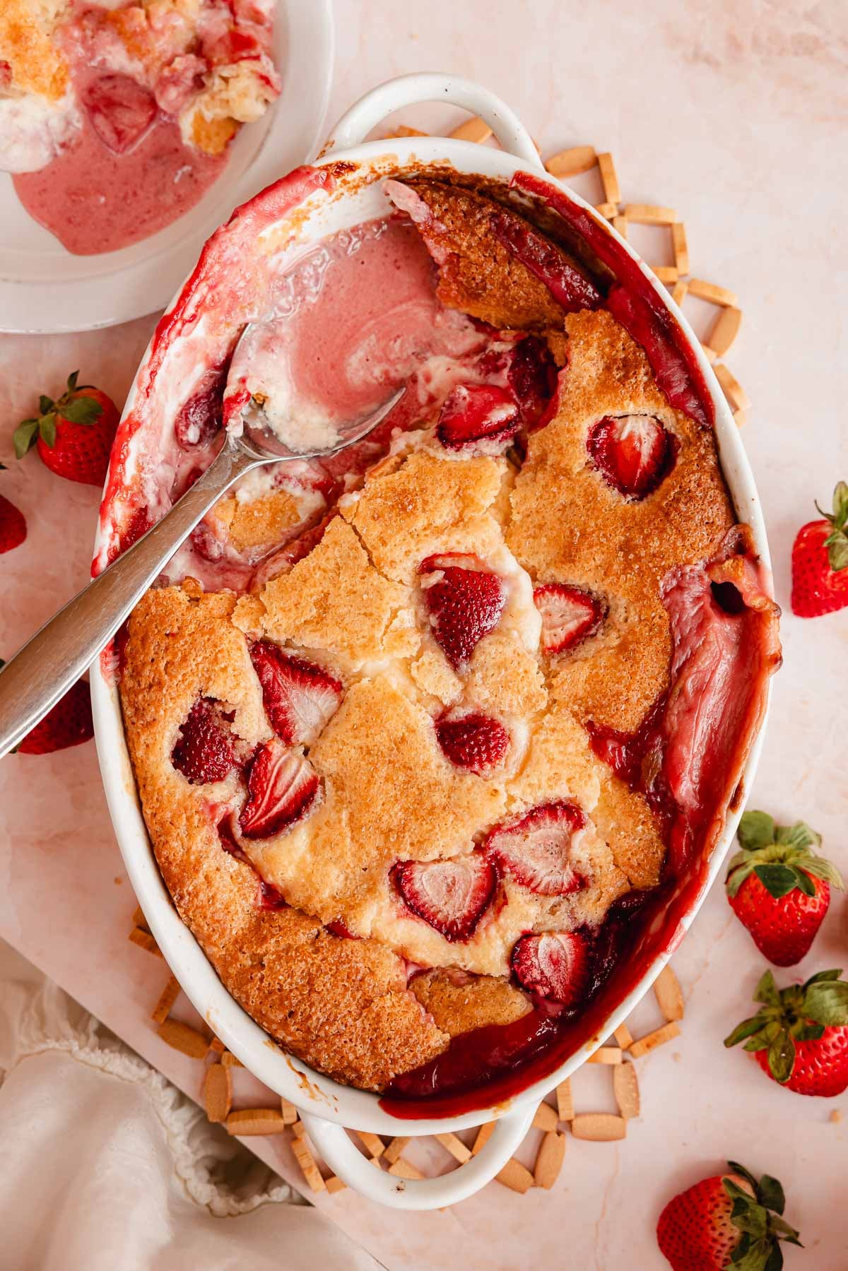 strawberry cobbler with scoop taken out