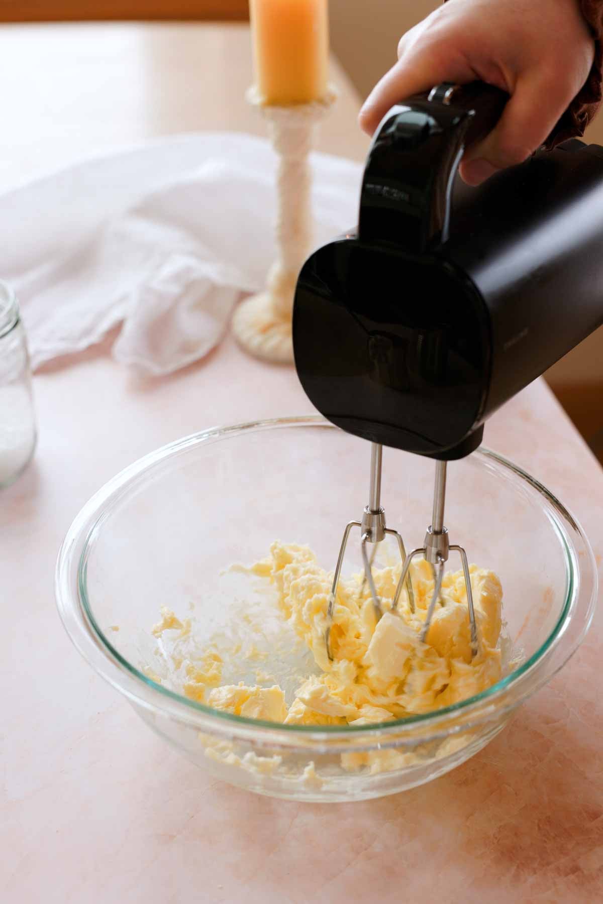 whipping butter until light and fluffy in a glass bowl