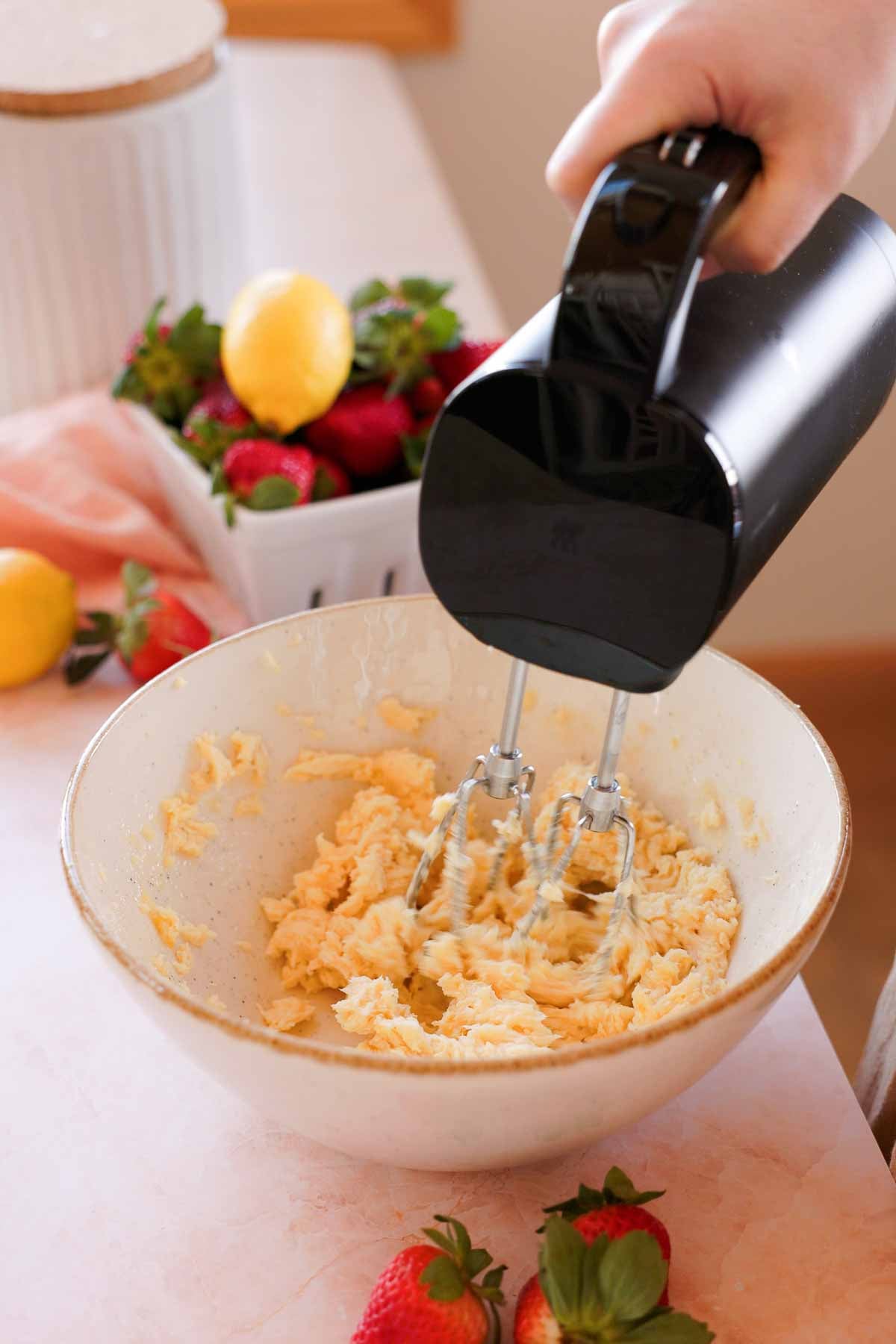 creaming butter and sugar together with electric mixer