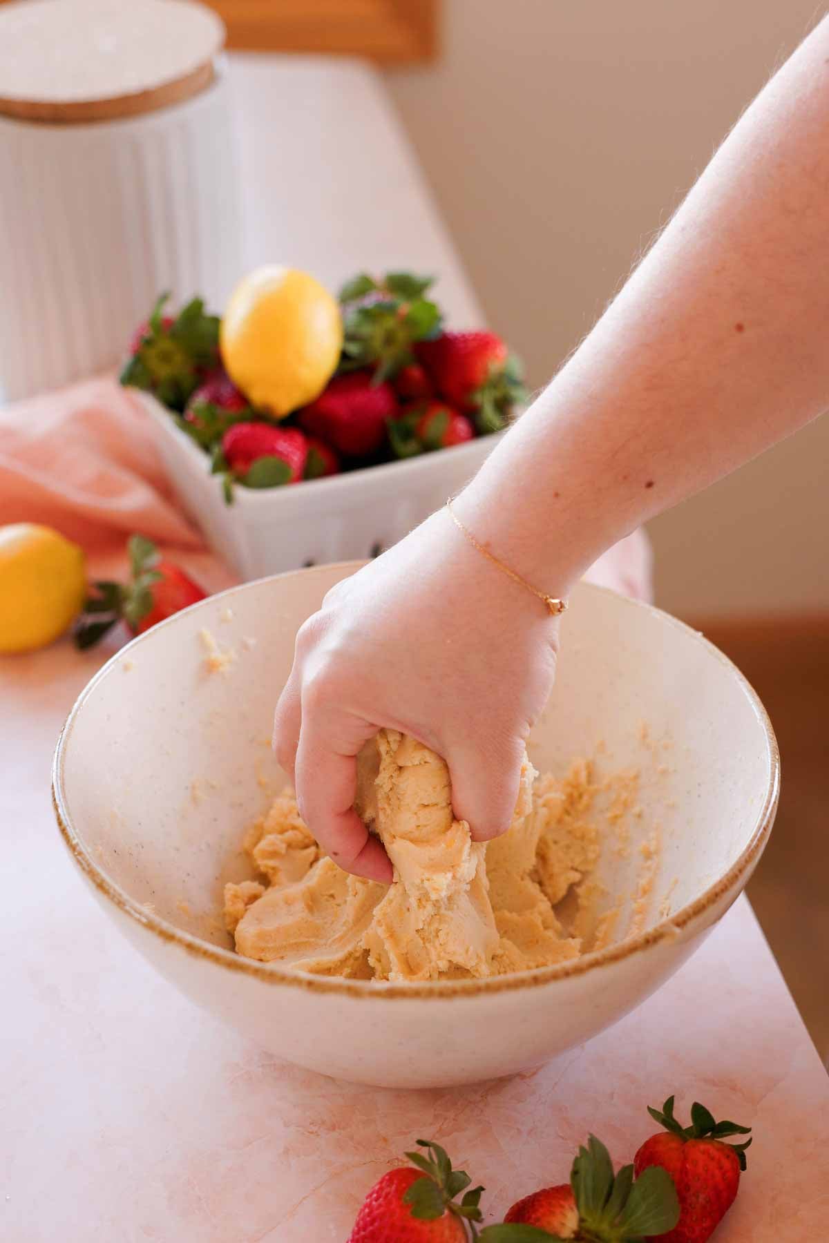 setting aside a portion of shortbread dough for crumb topping