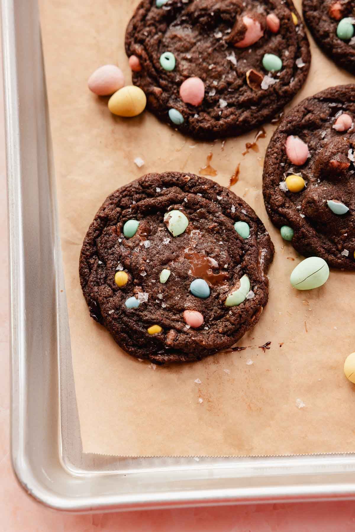 double chocolate mini egg cookies on cookie sheet