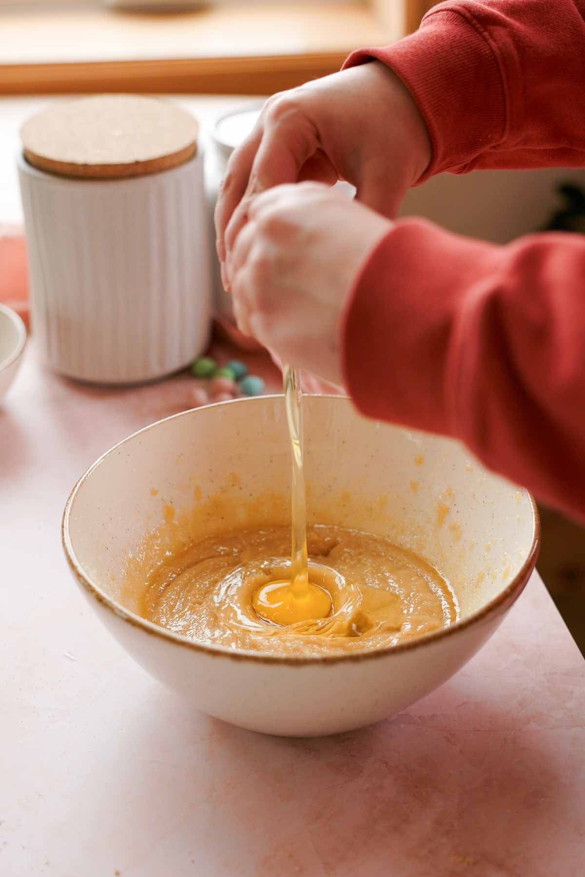 adding egg to mini egg cookie dough wet ingredients