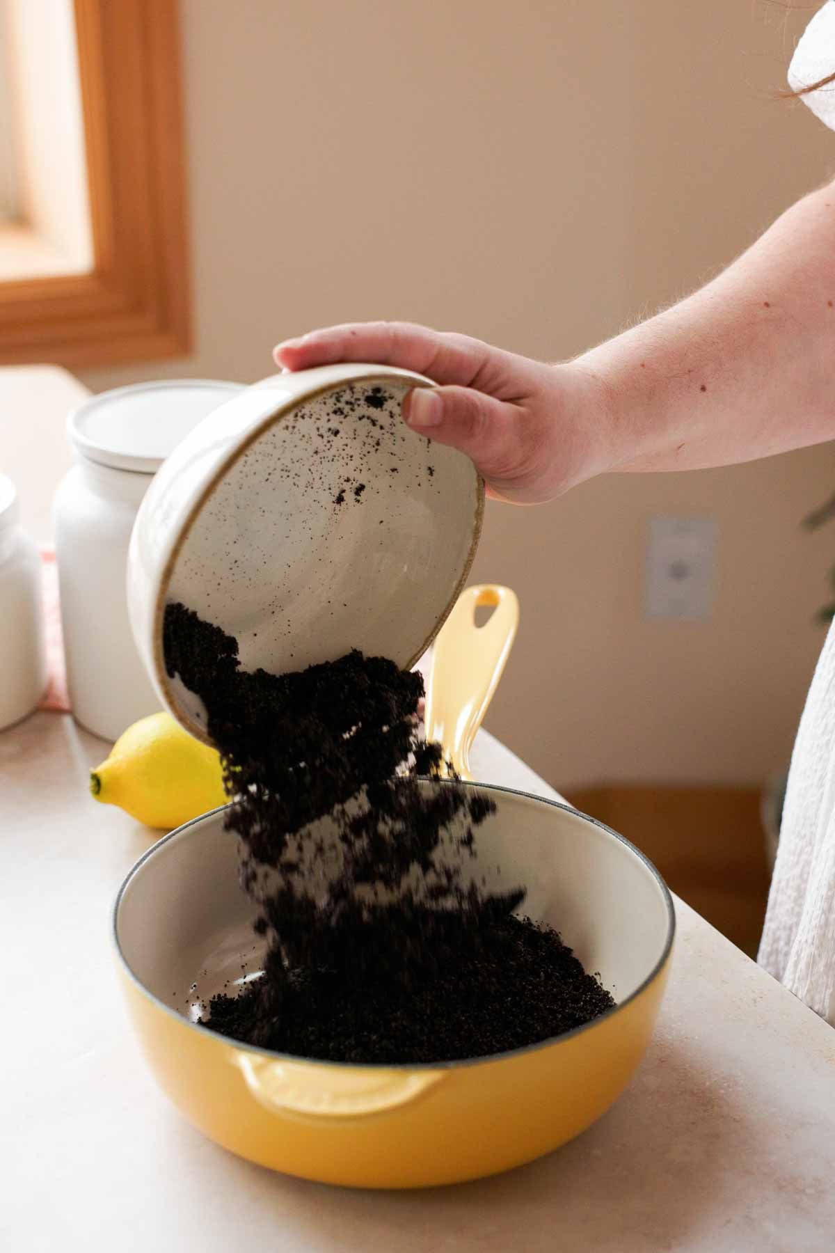 adding ground poppy seeds into saucepan