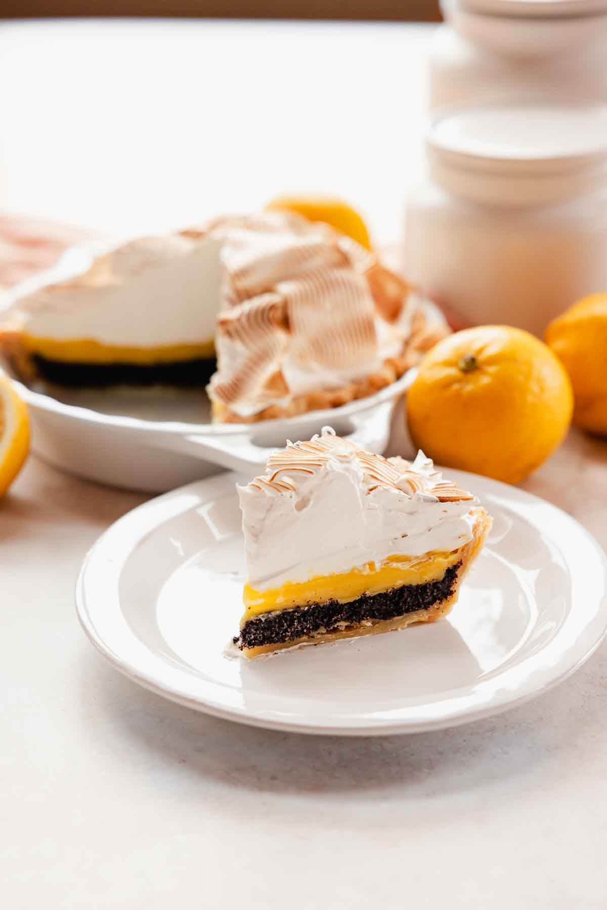 slice of lemon meringue pie with poppy seed filling