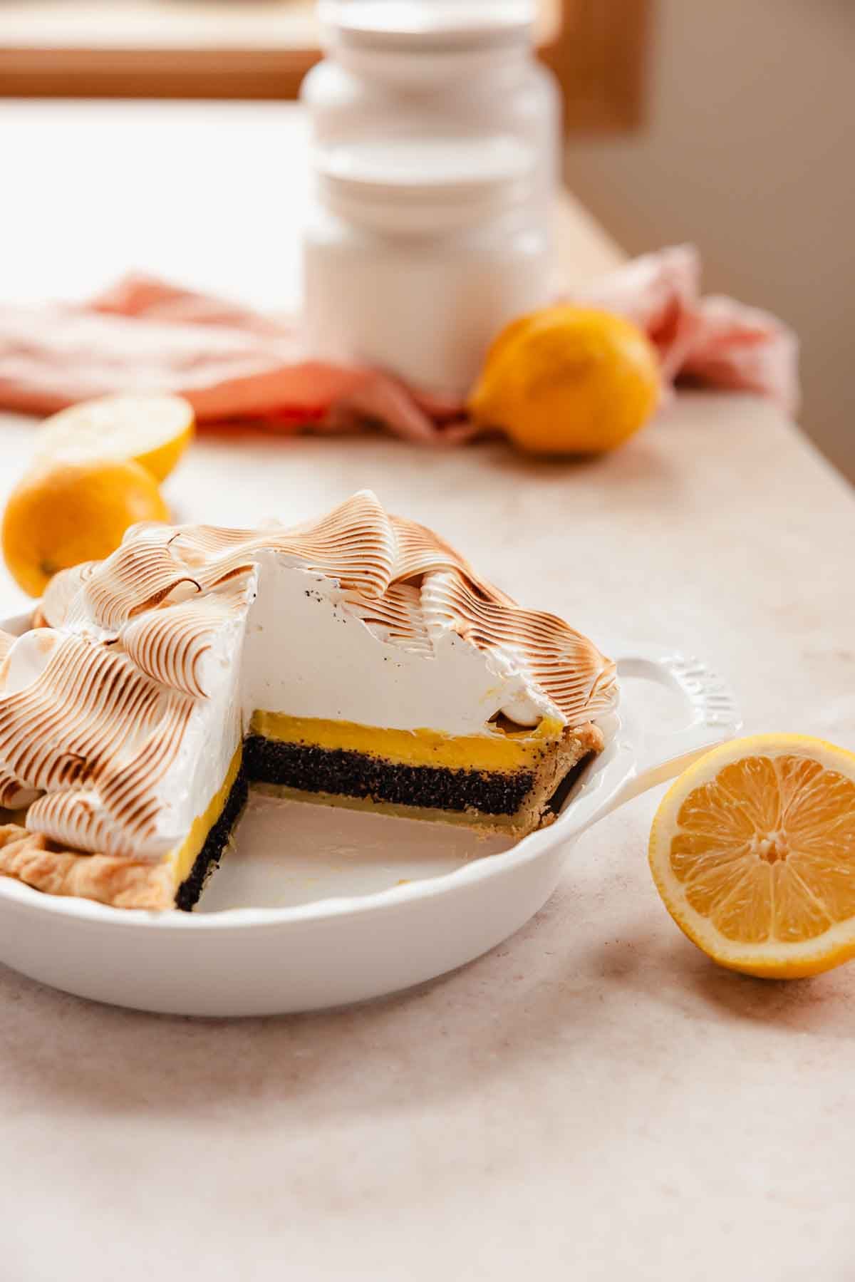 lemon poppy seed meringue pie inside pie plate