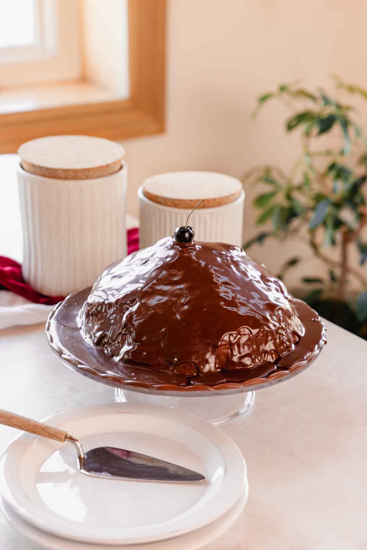 chocolate ganache volcano cake with cherry on top
