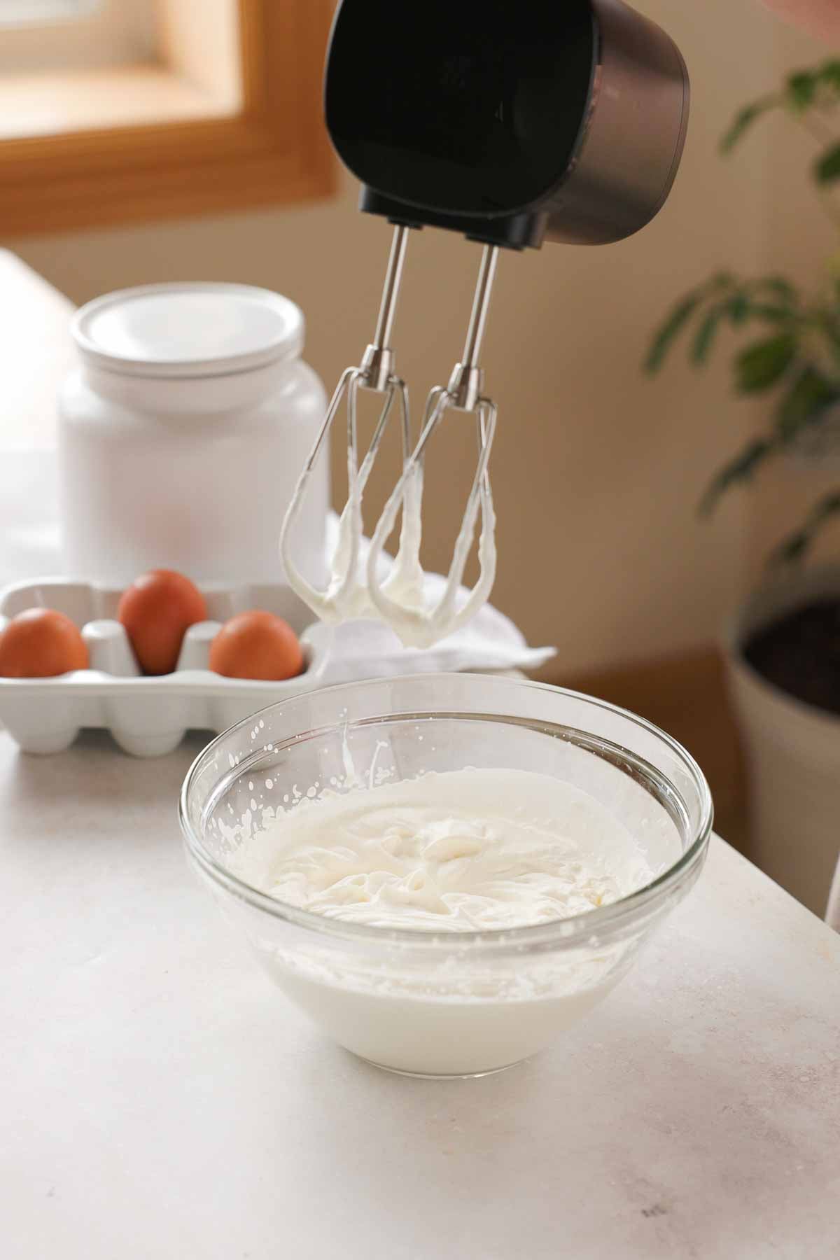 cream whipped to stiff peaks