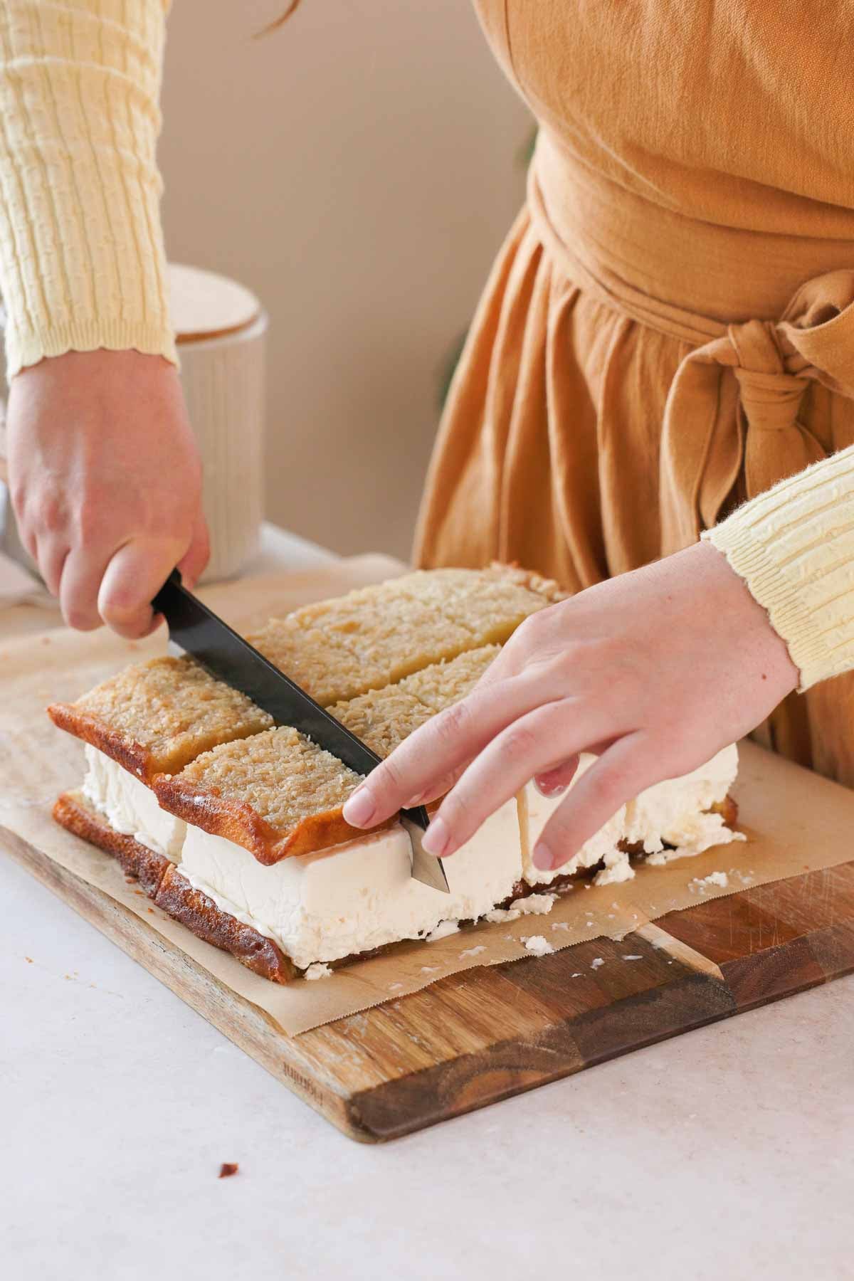 cutting butter mochi ice cream sandwiches into rectangles