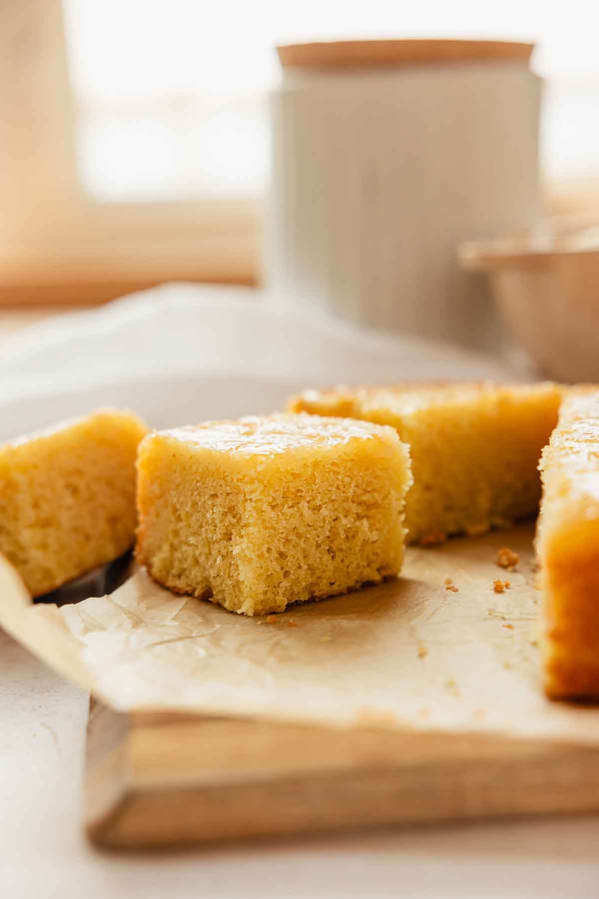 slice of upside down lemon cake with soft and fluffy texture