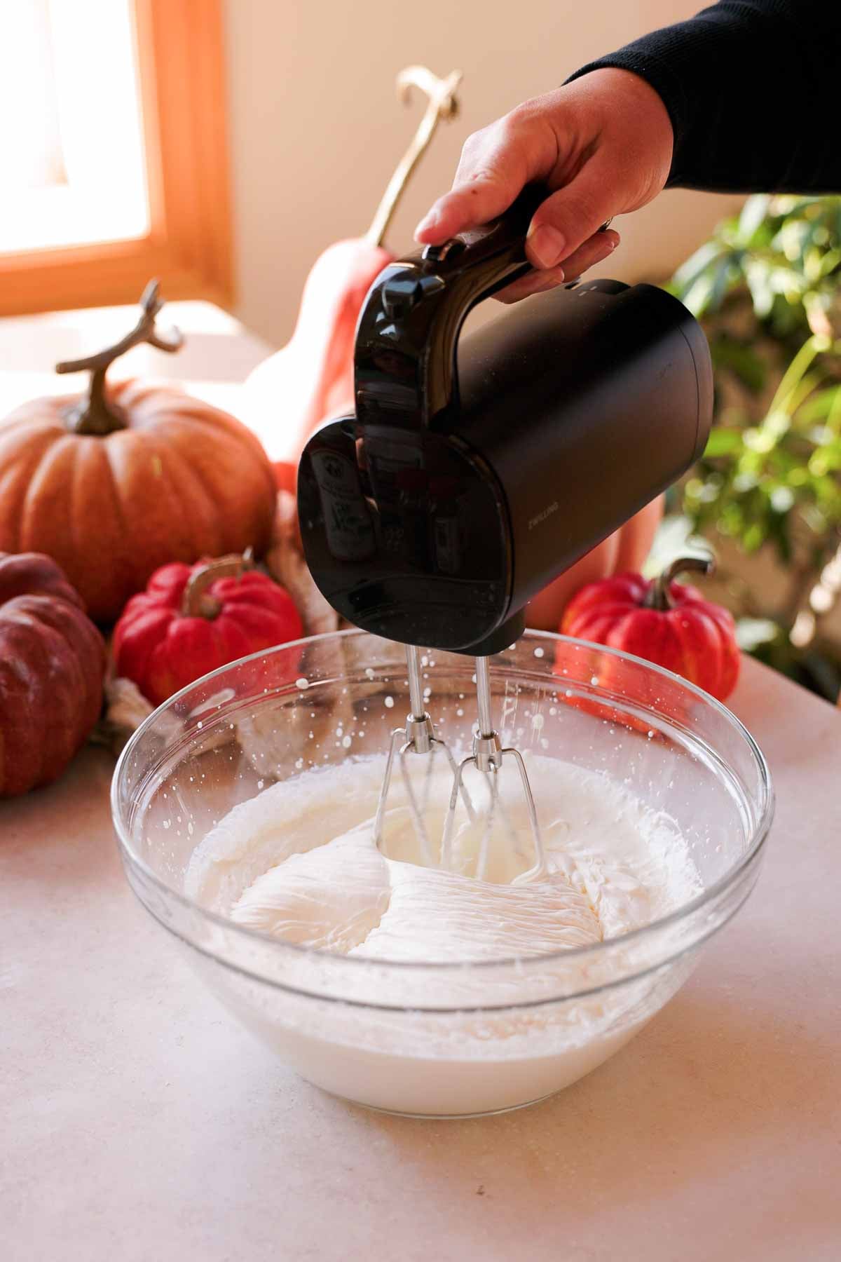 whipping heavy cream to medium stiff peaks