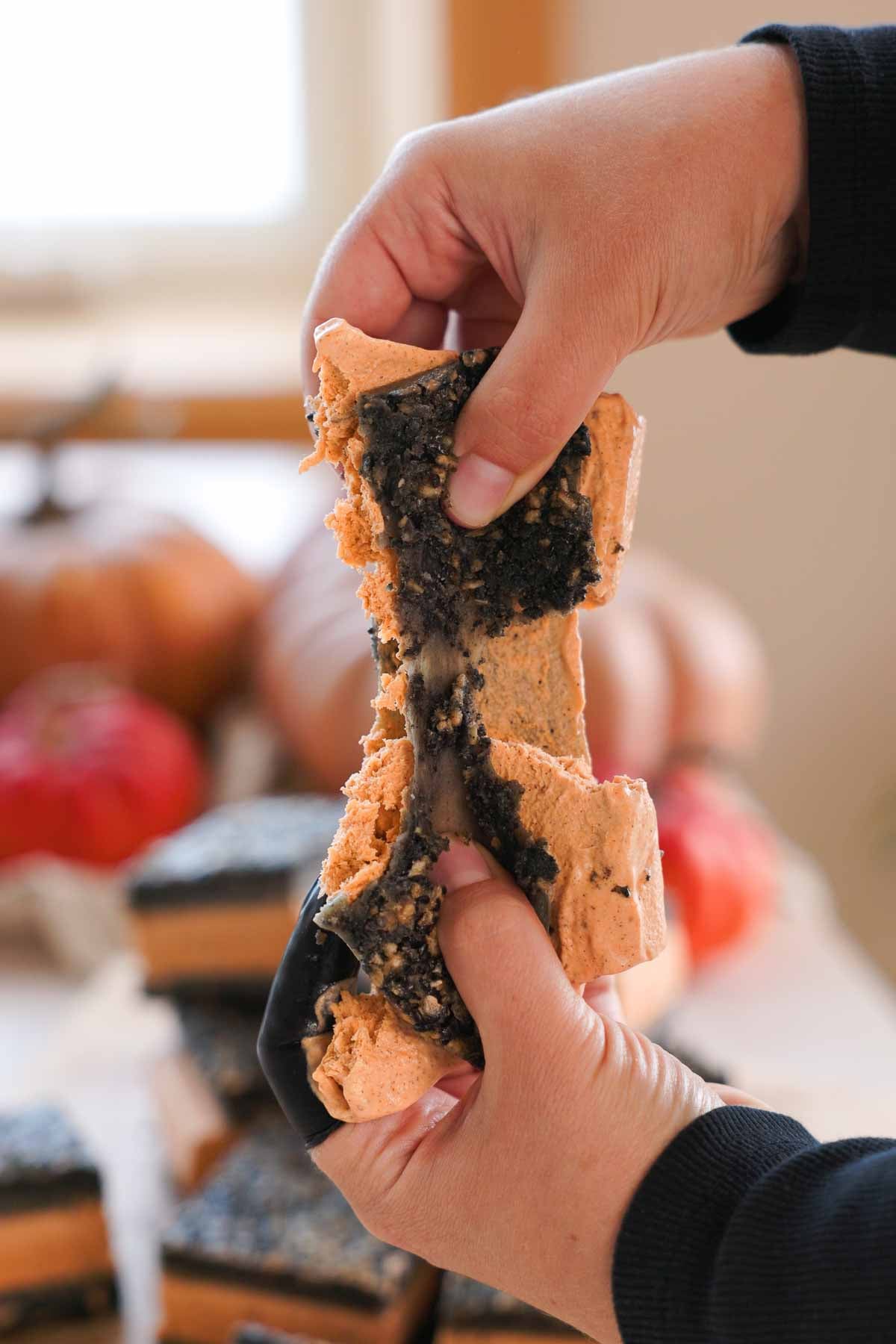 pulling apart stretchy black sesame butter mochi ice cream sandwich