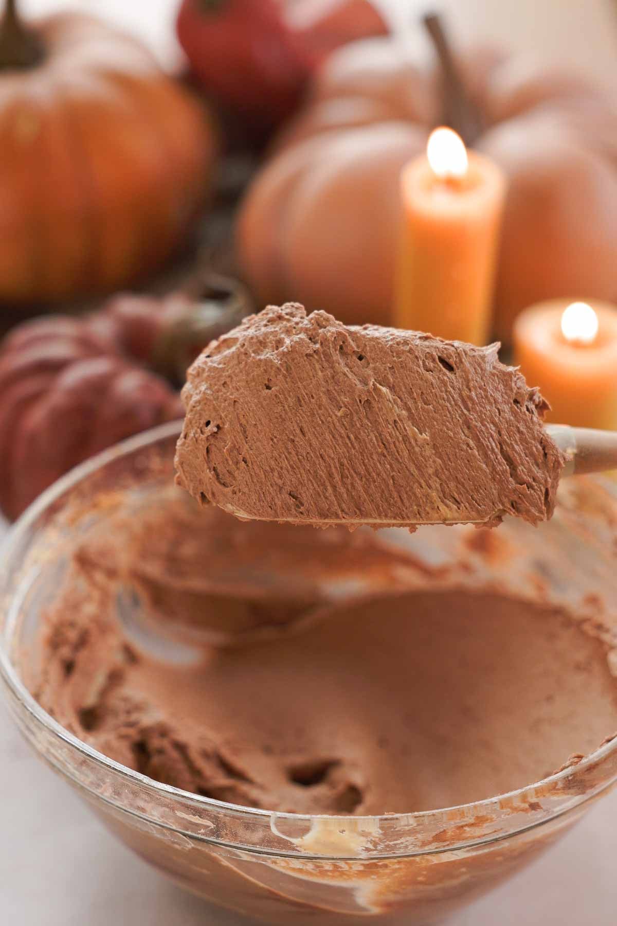 whipped chocolate pumpkin buttercream on silicone spatula